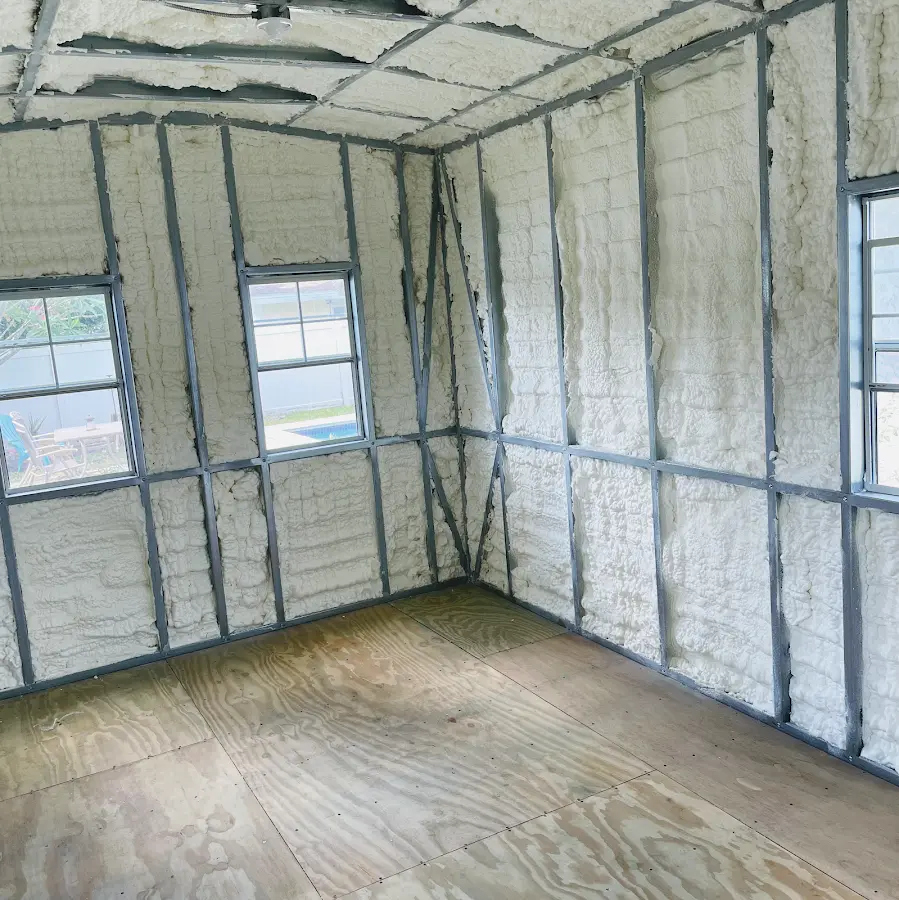 Closed-cell spray foam insulation applied to wall cavities in a residential project in Kenwood